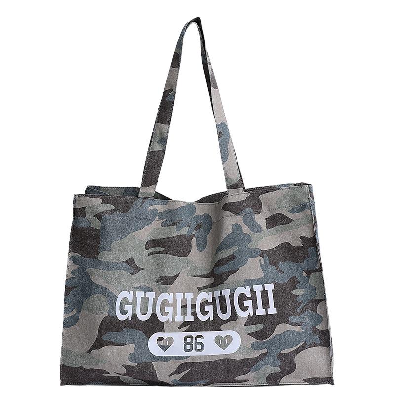 

Camouflage denim canvas bag women s new fashion large-capacity tote bag casual versatile underarm shoulder bag синий