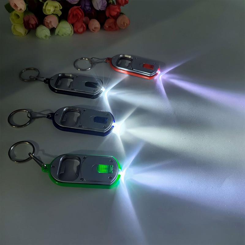 Ouvre-bouteille LED Multifonctionnel Mini Lampe de Poche Illuminée Porte-clés Pendentif