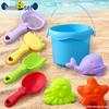Complete Beach Toy Set: Includes Shovel, Wheelbarrow, Bucket, and Water Toys for Kids' Sand Play at the Seaside.
