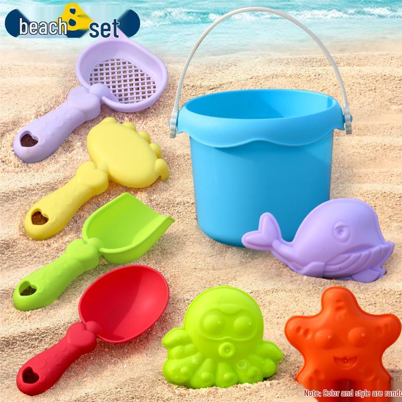 Complete Beach Toy Set: Includes Shovel, Wheelbarrow, Bucket, and Water Toys for Kids' Sand Play at the Seaside.
