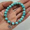 Braccialetto Elefante Turchese Unisex: Gioielli Intarsiati in Resina Blu Cielo Naturale