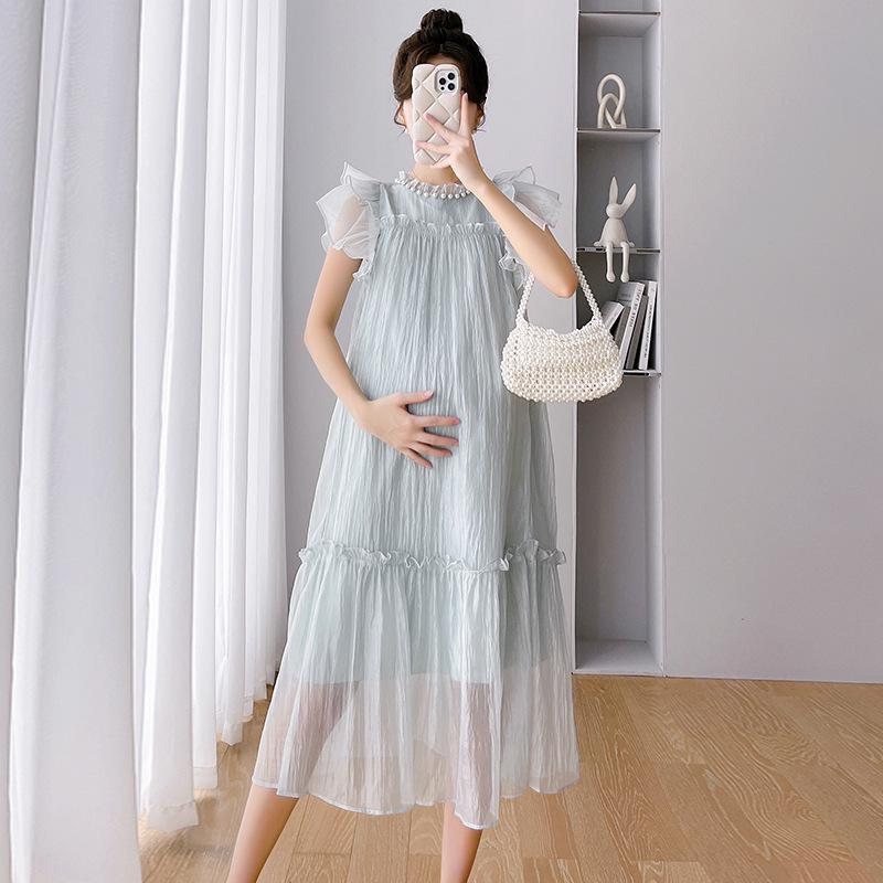 Dostępne teraz: Letnia sukienka ciążowa z falbankami na rękawach i perłowego tencelu, 2025