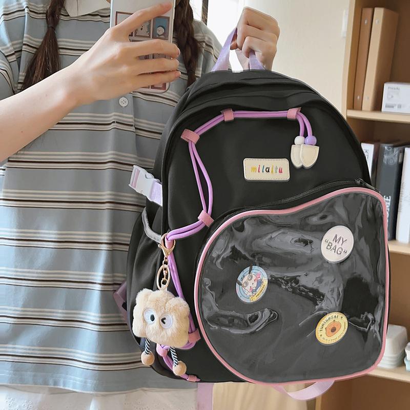 

Japanese versatile dopamine high-value backpack female cute pain bag sweet and fresh portable travel niche backpack single bag will send a badge.