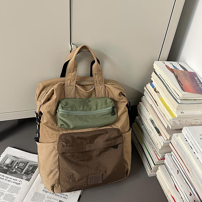 Portable backpack simple contrasting color middle school student backpack velvet square label schoolbag