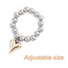 Fashionable Geometric Heart Pendant Ring Stainless Steel Elastic Rope Round Bead Jewelry for Parties and Everyday Wear