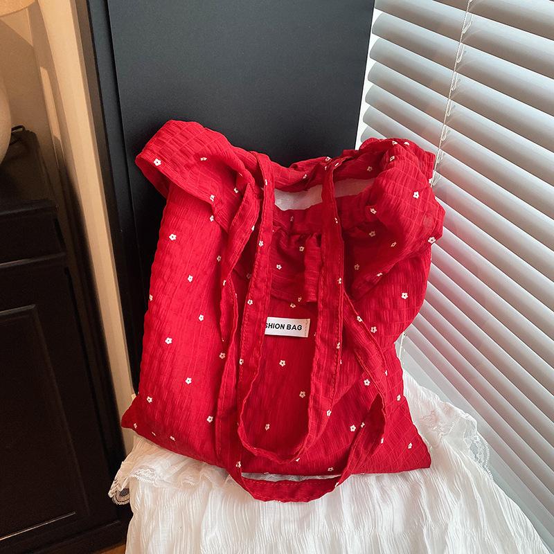 

2025 spring and summer new mesh shoulder bag fairy wind lotus leaf edge handbag female vacation chiffon bag червоний