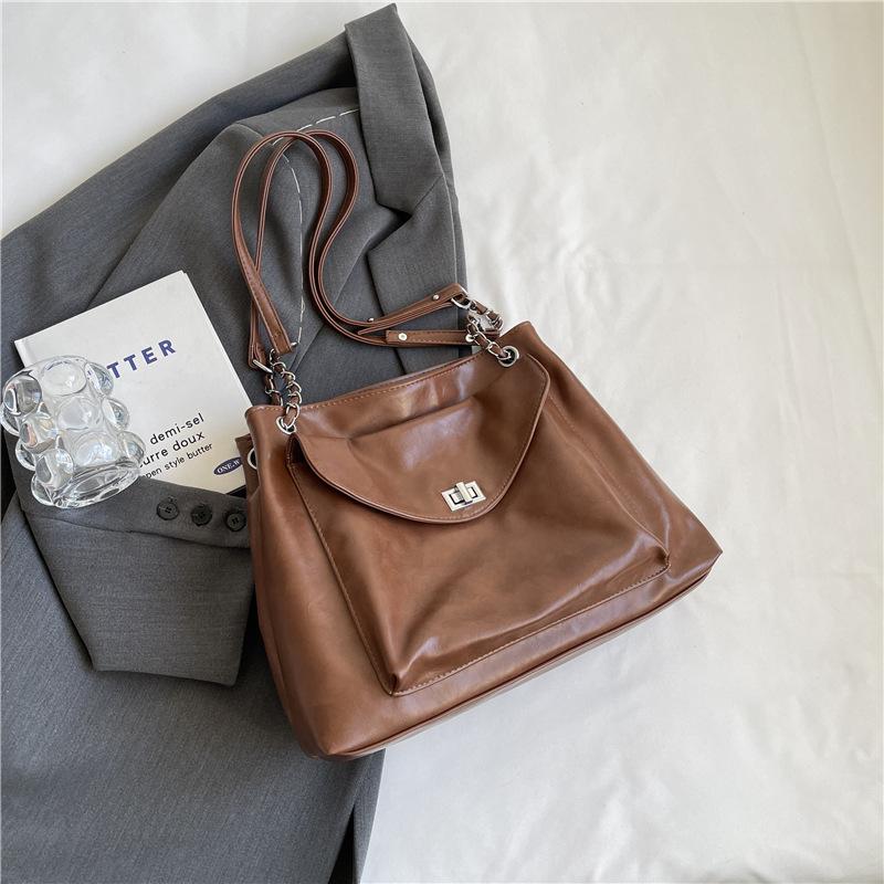 

This year, the popular silver stray bag women s 2025 new versatile shoulder underarm bag large-capacity commuter tote bag коричневый