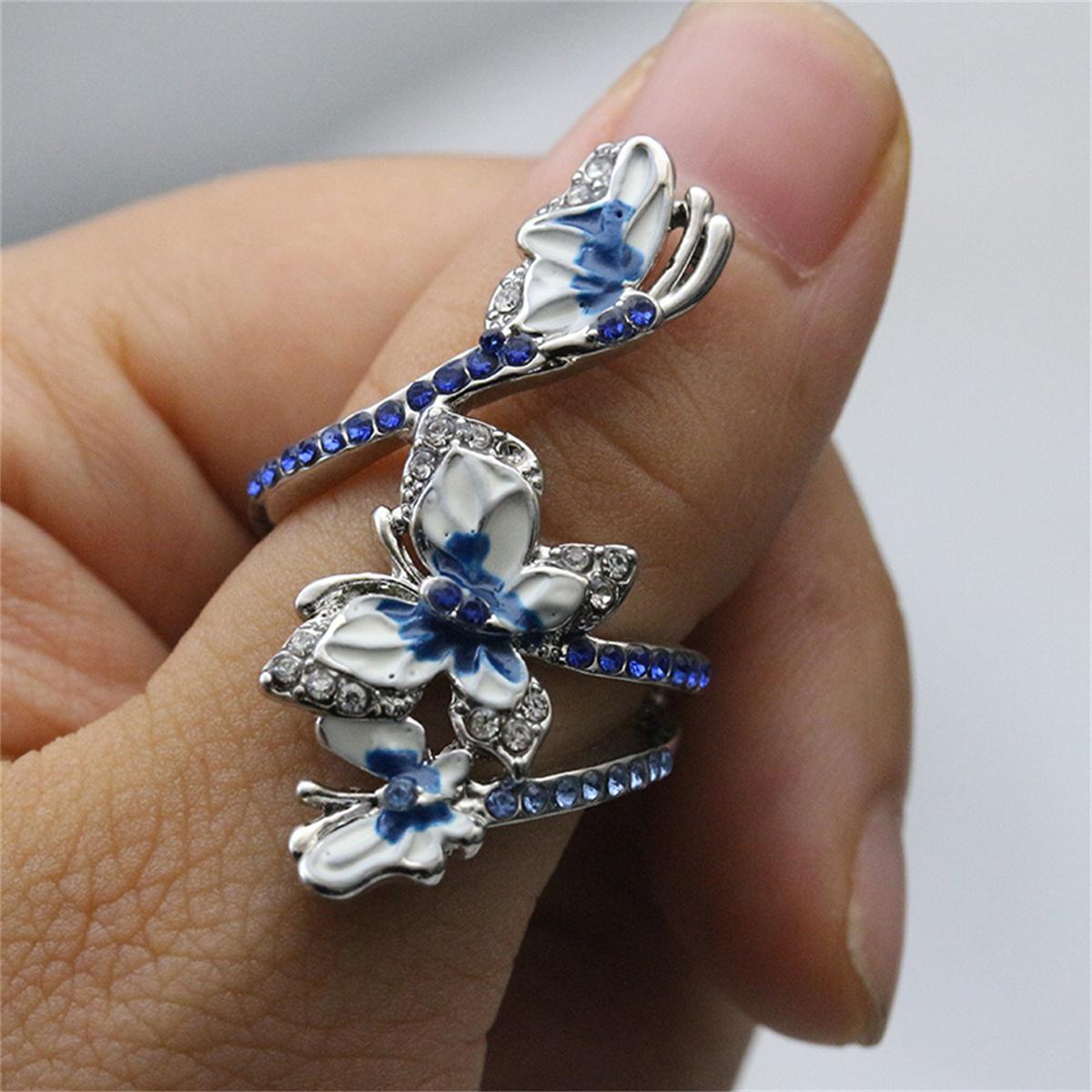 Очаровательное синее обручальное кольцо с бабочкой — фото 5