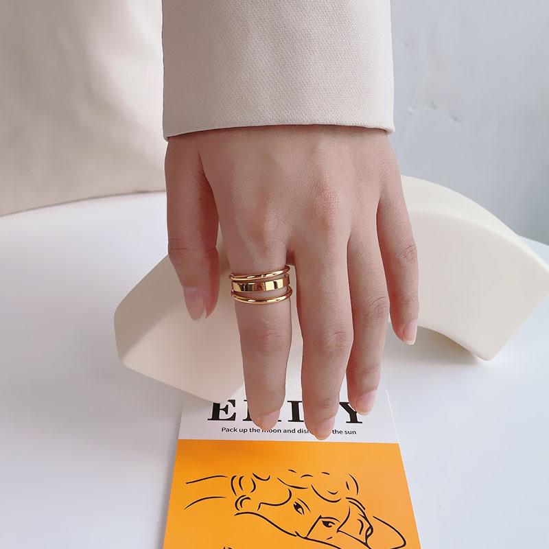 

Korean Minimalist Titanium Steel Wide-Face Ring for Women, 18K Gold Hollow Design, Unique High-End Jewelry. US Size 6