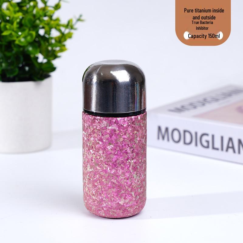 > Sleek Mini Titanium Antibacterial Double-Layer Thermos Cup - Portable, High-Value, Pocket-Sized.