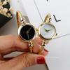 Luxusmode Damen Goldene Uhr Drahtarmband Anhänger Edelstahl Retro Damen Quarz Armbanduhr Kleine Uhr Lässige Uhren