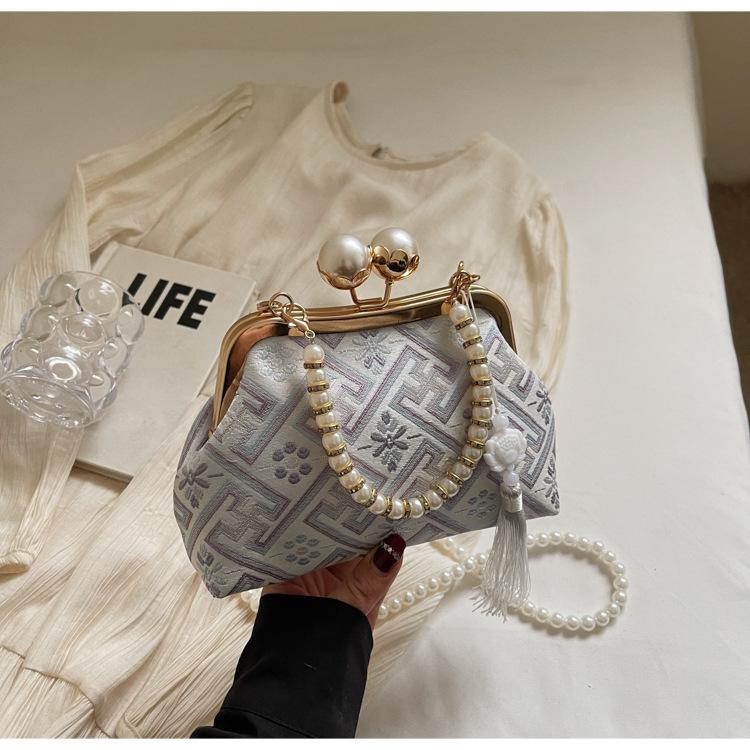 

Летняя супер огненная нишевая сумка женская 2025 новая изысканная универсальная портативная сумка-пельмень популярная сумка-мессенджер фиолетовый