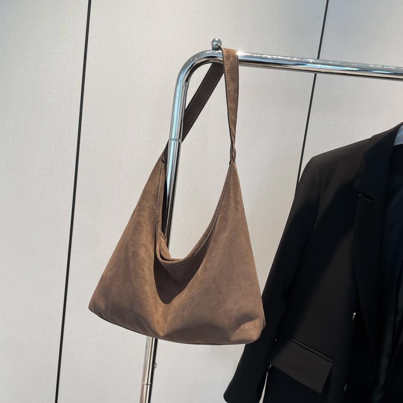 Large Capacity Niche Casual Commuter Tote Bag 2025 New Fashion Personalized Armpit Bag Retro Simple Shoulder Women's Bag