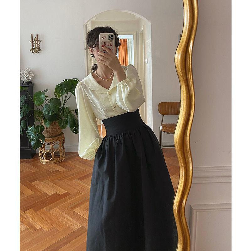 

Женская весенняя однотонная винтажная юбка средней длины с пластиковой талией, облегающая до талии, литературная элегантная длинная юбка XL чёрный