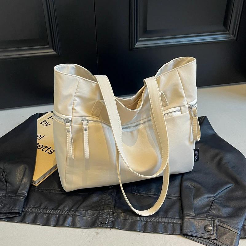 Neue lässige Reißverschluss-Umhängetaschen mit großem Fassungsvermögen im Basic-Stil, neue Hot-Sale-Taschen für junge Frauen, Damentaschen