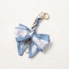 Elegant Hand-Woven Scarf Chain with Bow Decoration Pendant for Bag Strap Modification.