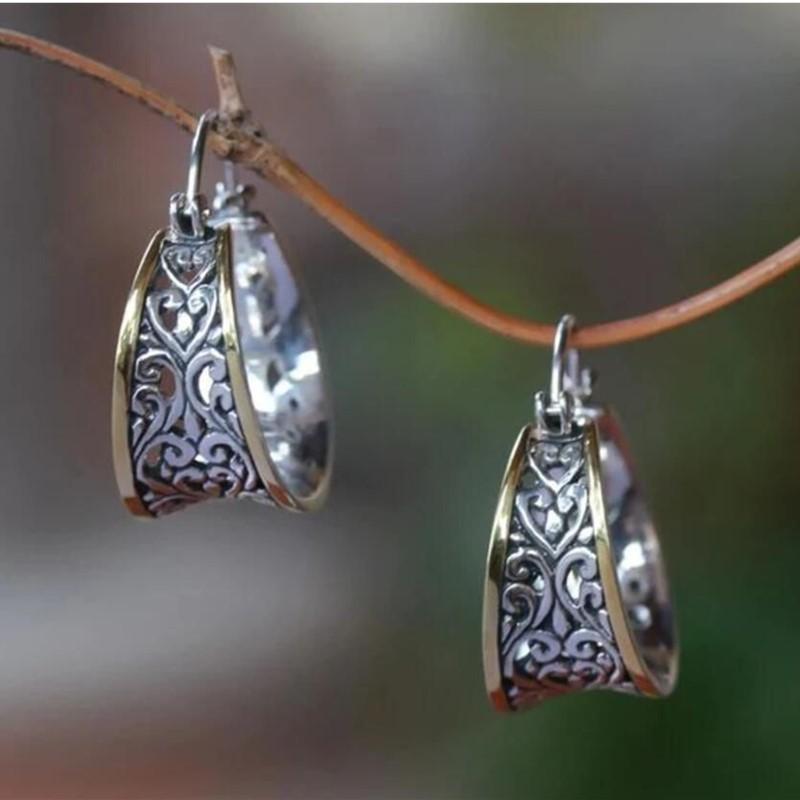 

Fashionable hollow earrings срібний