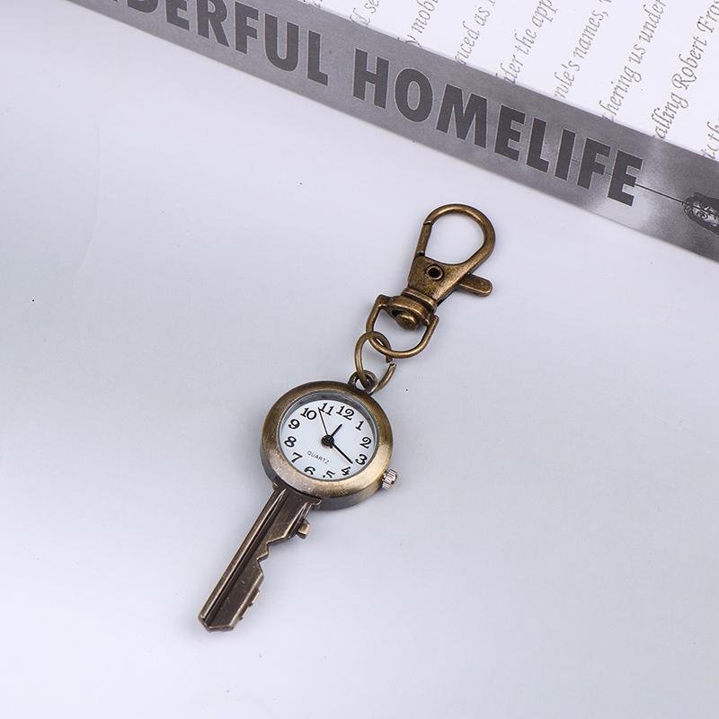 Niedliche schöne Taschenuhr im Markenstil mit Schlüsselanhänger und Kette aus Quarz