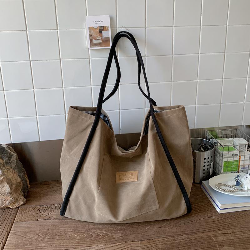 

2025 осень новая текстура повседневная большая вместимость замшевая сумка-тоут иностранный стиль щедрая высокая ценность сумка через плечо женская хаки