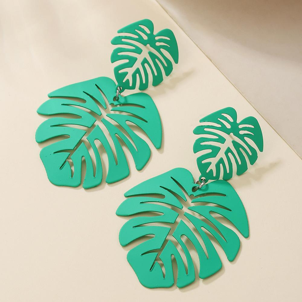 Hot Sale Summer Vacation Wind Hollow Leaf Earrings European and American Fashion Design Exaggerated Leaf Alloy Earrings