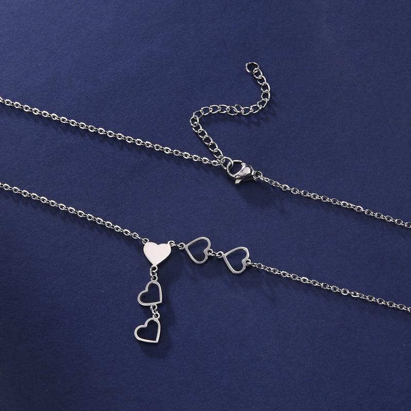Stainless Steel Heart-Shaped Pendant Necklaces for Women Ladies Elegant and Exquisite Hollow Long Necklaces Jewelry Accessories
