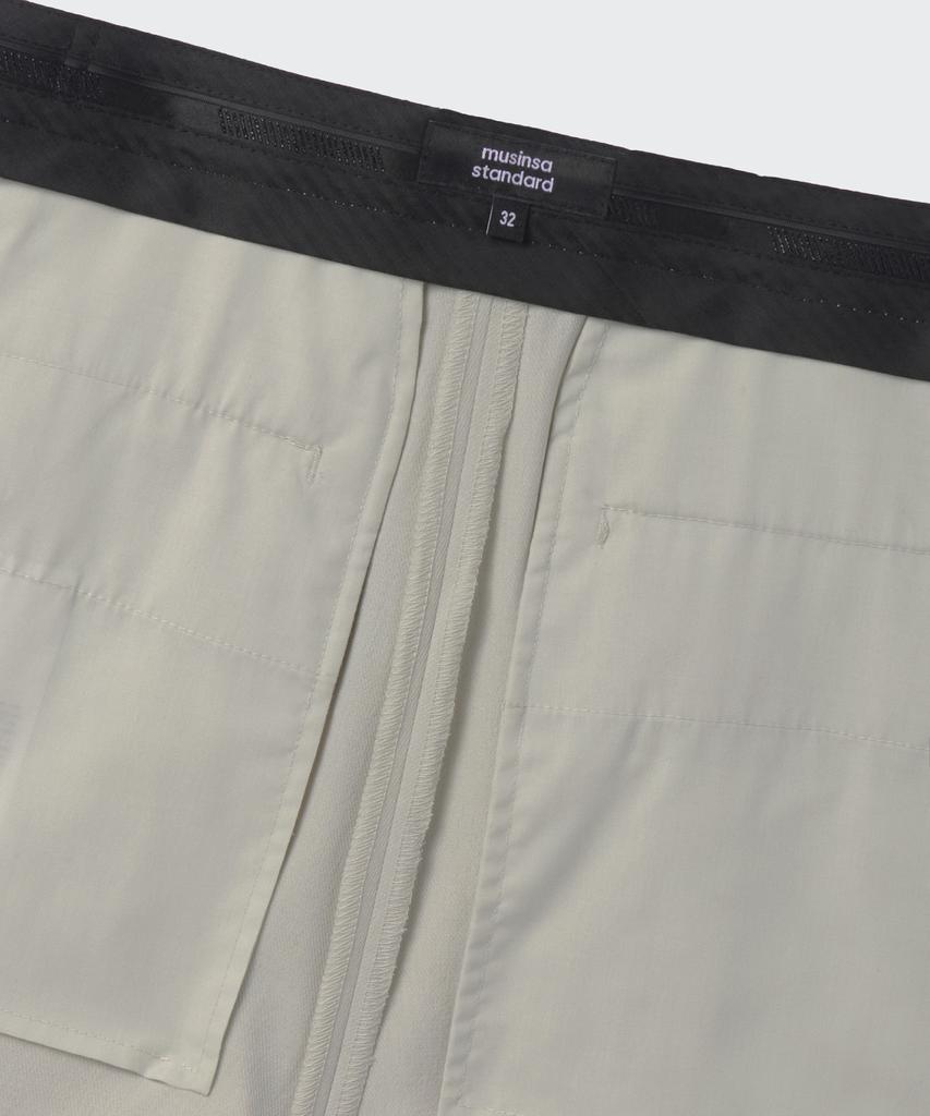 Musinsa Standard Cool Touch Hidden Banding Half Slacks [Dusty Cream]