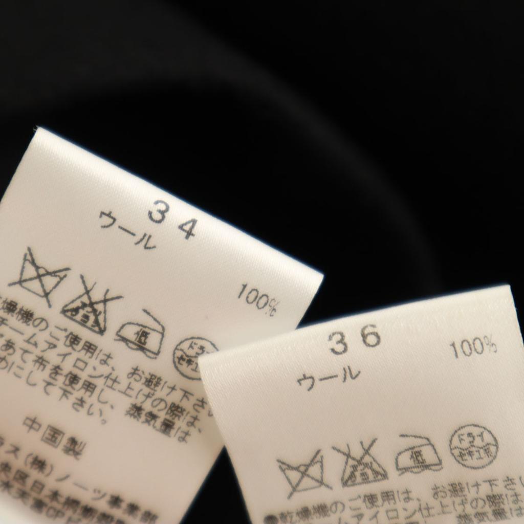 Terno de saia de lã com notas cítricas Conjunto 36/34 preto Feminino Usado