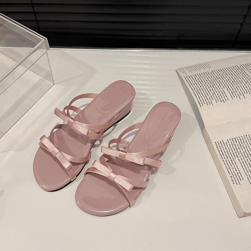 

Bow thick-soled open-toed versatile sandals spring and summer fairy style French slope heel heightening small cool slippers outside 40