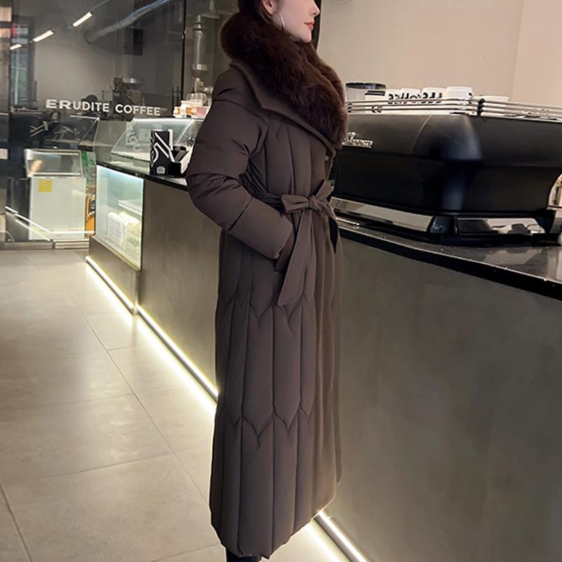 Plussstørrelse L-7XL Mote Vinterjakker Dame Lang Parkas Hette Stor Fuskepelskrage Løs Tykk Varm Overfrakk Casual Damekåper Med Belte