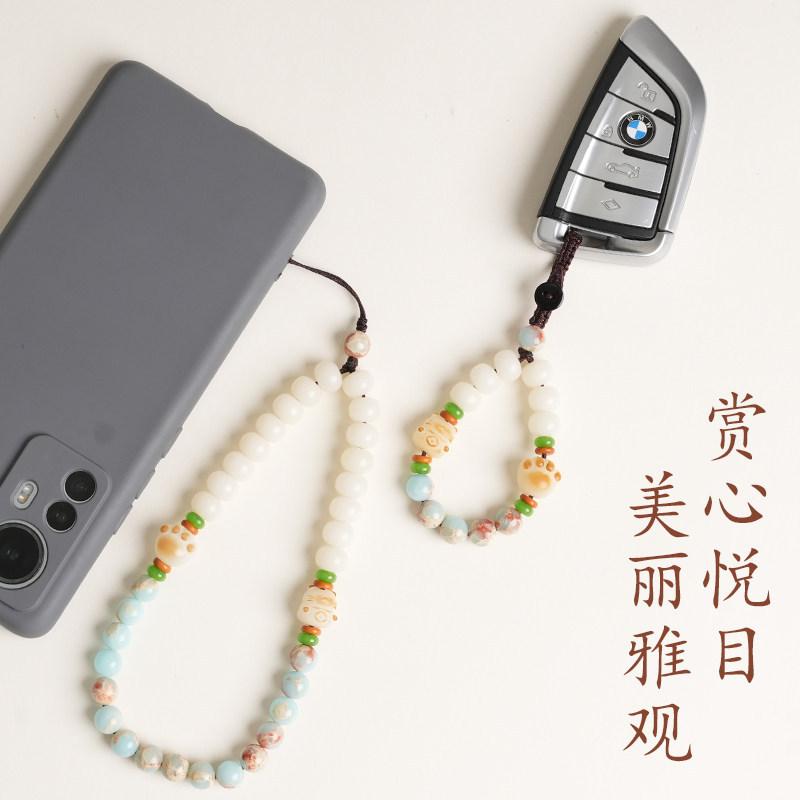 Exquisite white jade Bodhi Shoushan stone phone chain with carbon-burned cat paw design, cute anti-lost keychain pendant
