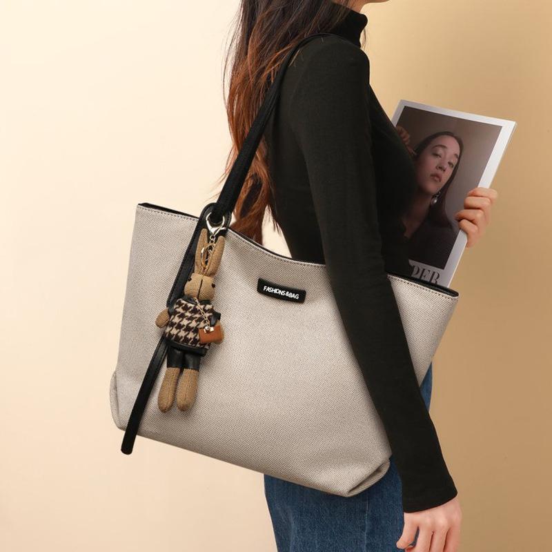 Casual large-capacity bag women's bag spring and summer new versatile canvas bag commuter shoulder bag simple tote bag