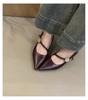 2025 new pointed temperament metal buckle one-word strap high heels light mouth low heel French commuter black single shoes women
