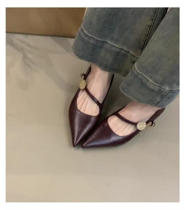 2025 new pointed temperament metal buckle one-word strap high heels light mouth low heel French commuter black single shoes women