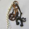 International Handcrafted Leather Bags, Ornaments, Keychains, Pretzel & Kitten Pendants, Accessories, and Cute Bag Charms.