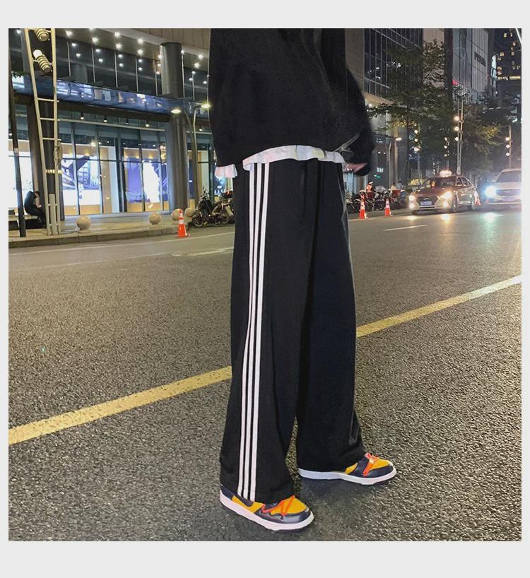 Damskie spodnie sportowe w paski w stylu koreańskim - luźne, sięgające do ziemi, w jednolitym kolorze, na wiosnę i jesień