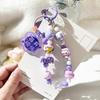 Purple Cartoon Ragdoll Bracelet with Raspberry and Distressed Text Short Bead Keychain Bag Universal