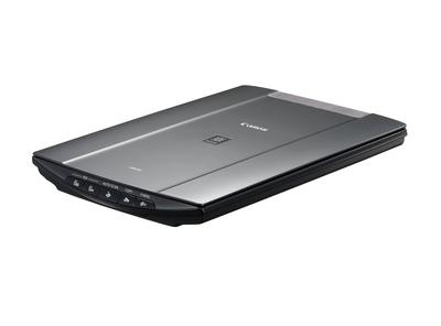 Stary model skanera płaskiego Canon CanoScan LiDE210 A4 zgodny z czujnikiem CIS 4800 dpi RGB LED wyposażony w zasilanie magistralą USB zgodny z 3-kolorowym