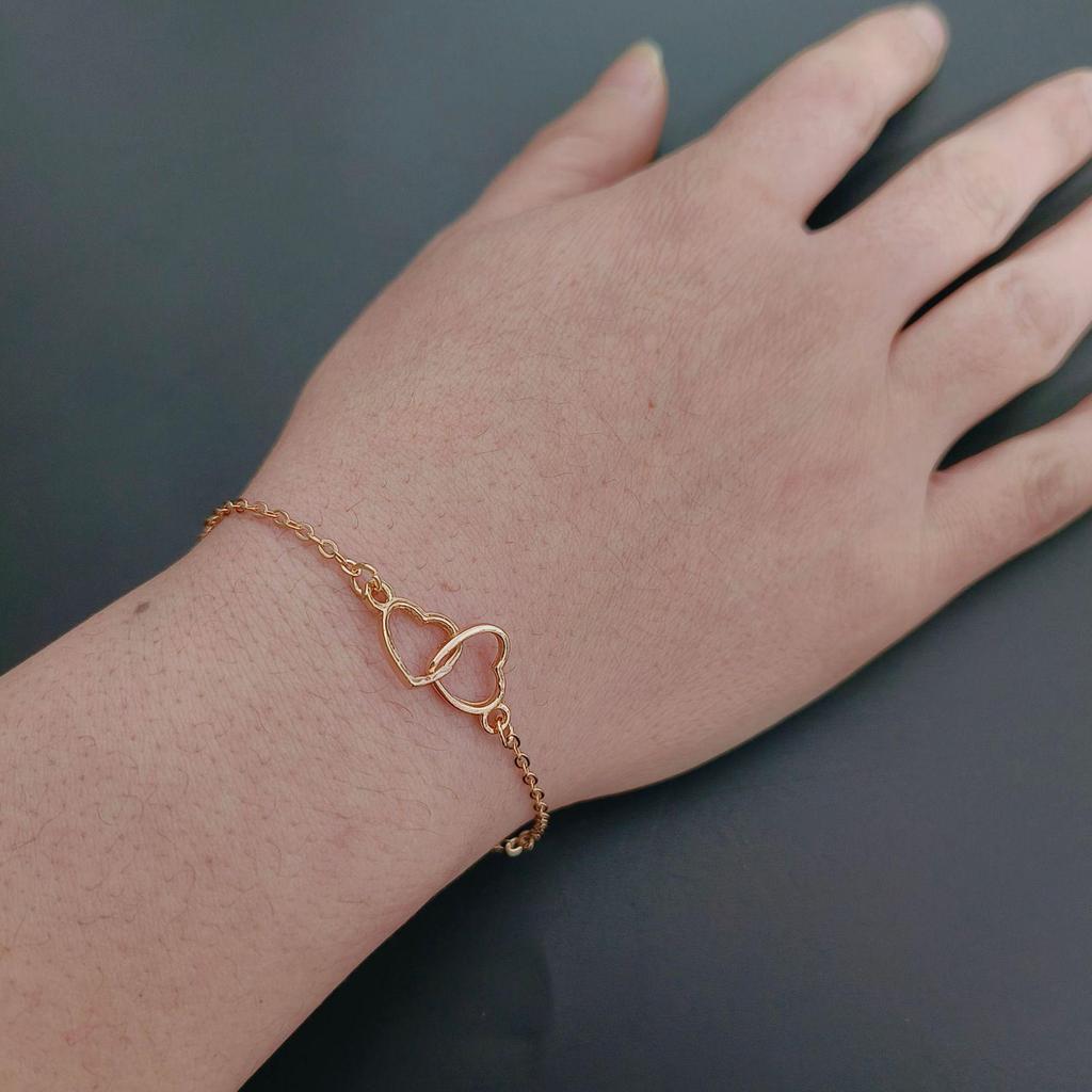 Interlocking Hearts High-End Women's Bracelet - Creative, Simple, Hollow Heart Design
