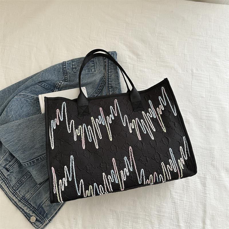 Fashionable Medium Sized Womens Tote Bag With Soft Structure And Interior Pockets