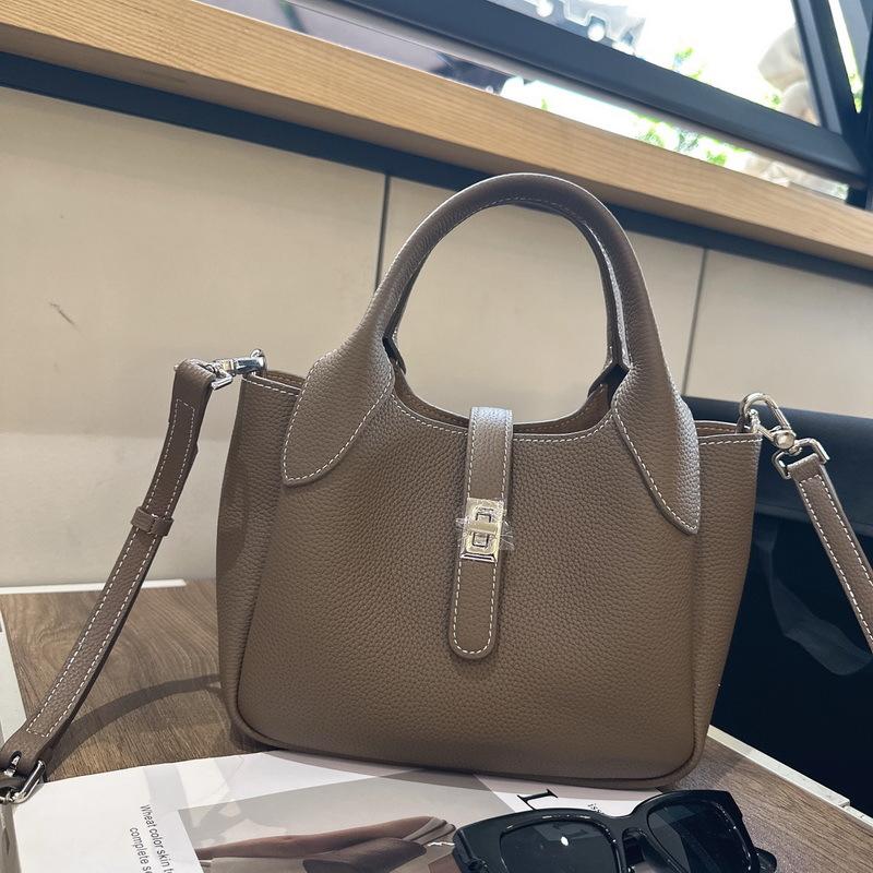 New Leather Women's Bag First Layer Cowhide Li Pattern Leather High-end Feeling Hand Carrying Bucket Bag Women's Lychee Pattern Basket Bag