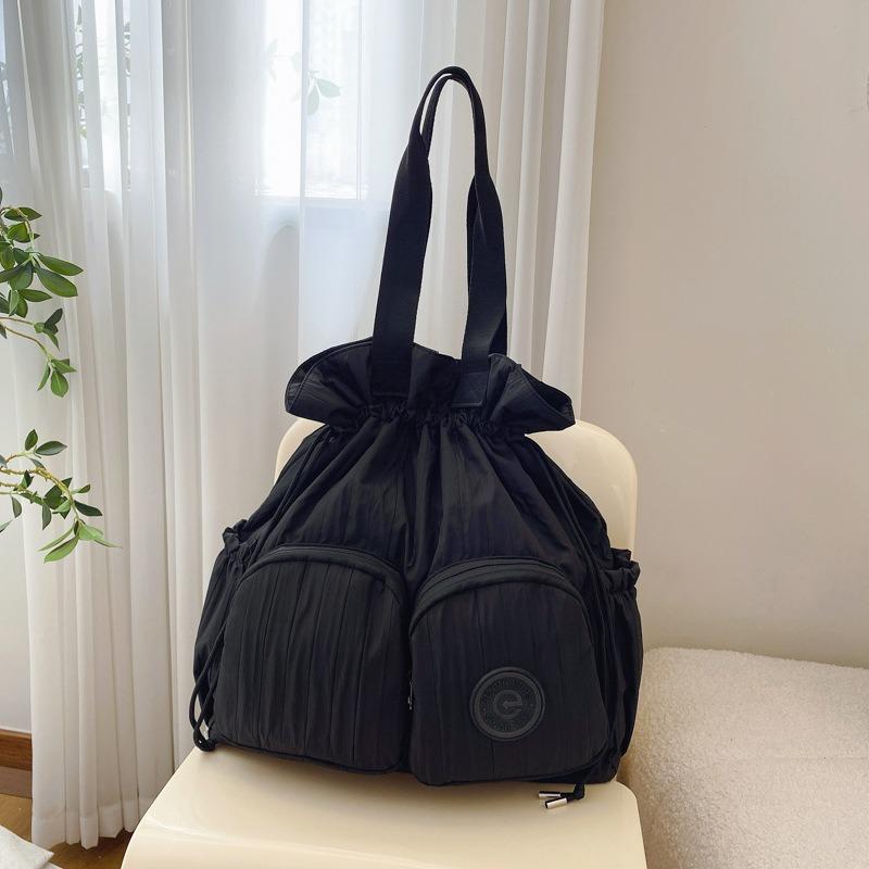 Academy style high value large capacity backpack women's new niche pleated drawstring shoulder bag