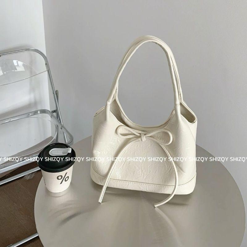 

South korea Niche Portable Bucket Bag Women 2025 Summer New Bow Tote Bag Commuter Pleat Shoulder Bag White