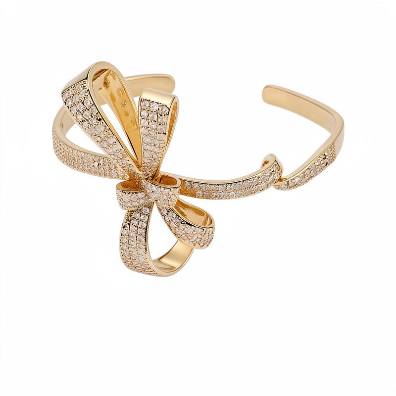 Ningguang Gold-Plated Zirconia Bow Cuff Bracelet: Luxury European-American Fashion Accessory