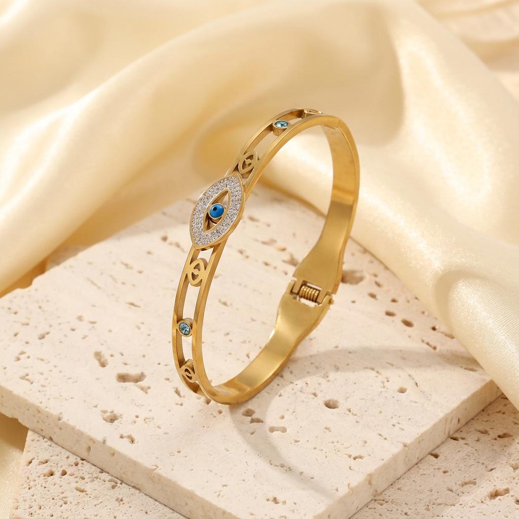 Dämonenauge Titanstahl Strassstein Armband - Modisches Hohl Design