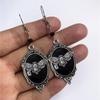 Boucles d'oreilles pendantes Géométrie Rétro Gothique Couleur Argent Forme Ovale Dentelle Relief Papillon Crâne pour Femmes Bijoux de Sorcière Mystérieuse pour Halloween