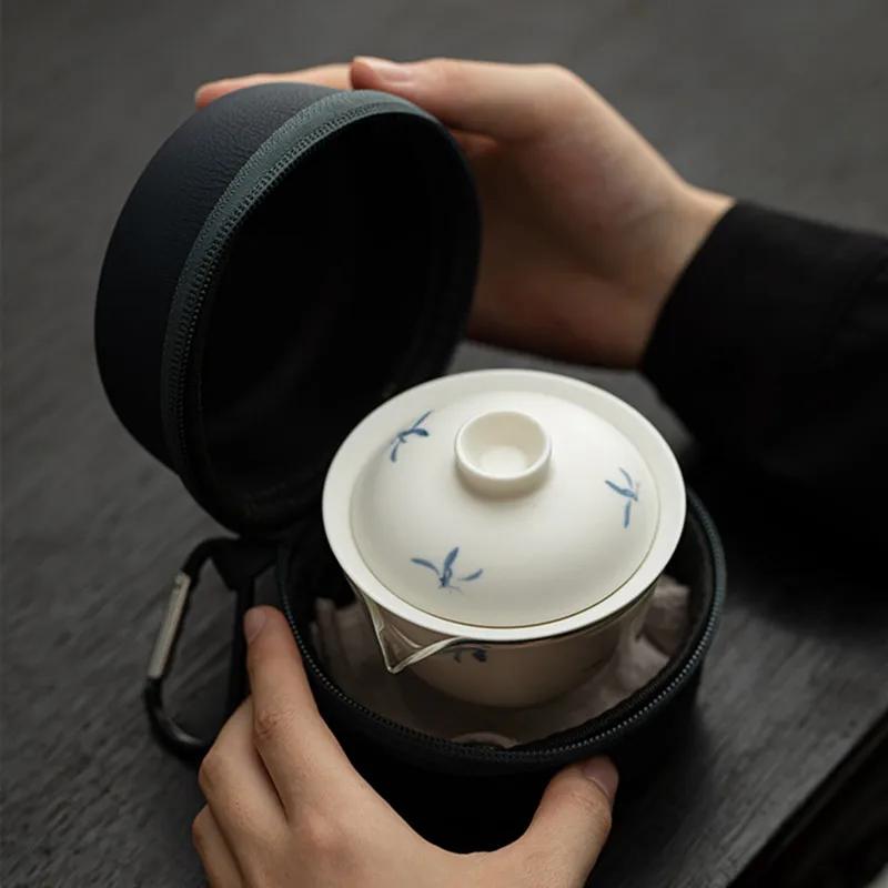 Chinesisches tragbares Reise-Keramik-Teeservice Handbemalte Orchidee Gaiwan Teetassenset Glas Fair Cup Schönheits-Tee-Sieb Handgefertigtes Geschirr