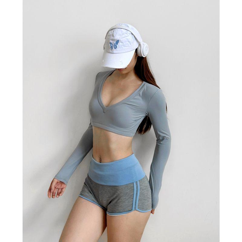 

Йога Красота Вырез на спине Пилатес Наряд с открытым животом Сексуальная футболка с длинными рукавами для тренировок и упражнений Тренировочные короткие топы с нагрудными подушечками Rhino Gray S