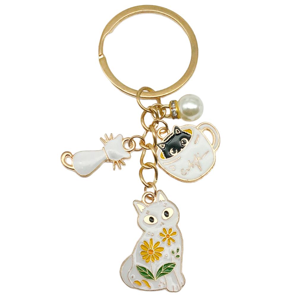 White Cat Pearl Teacup Keychain Ornament - Cartoon Drip Oil Finish