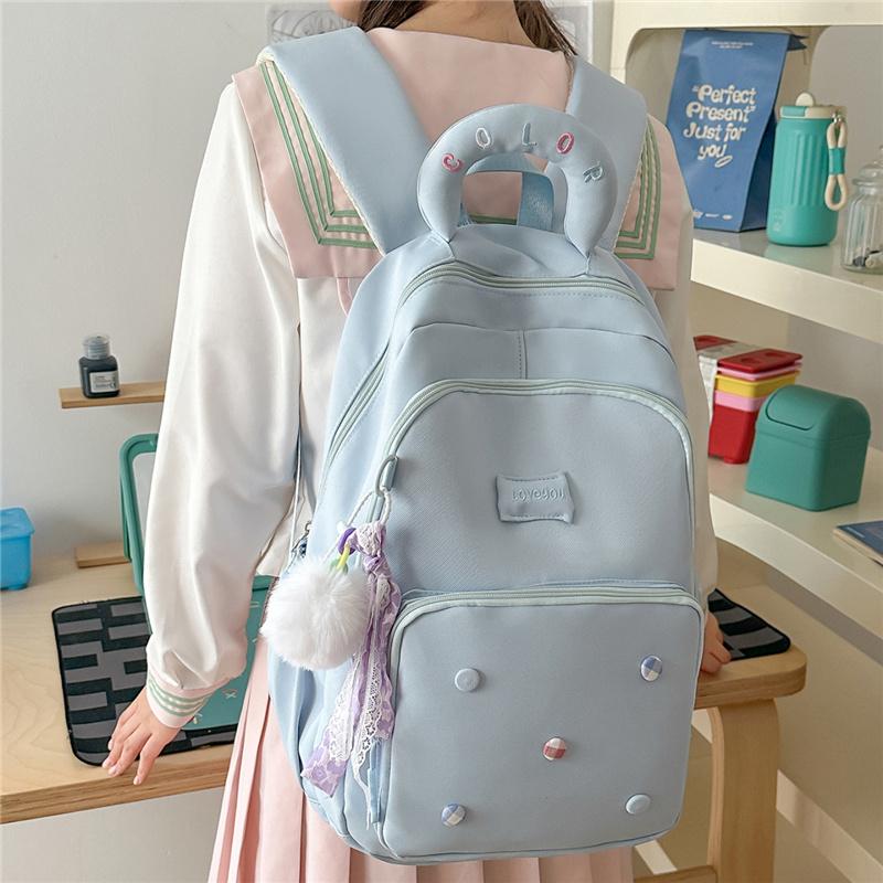 Cute Light Blue Backpack with Padded Top Handle Front Zipper Pocket Adjustable Straps Casual School Bag