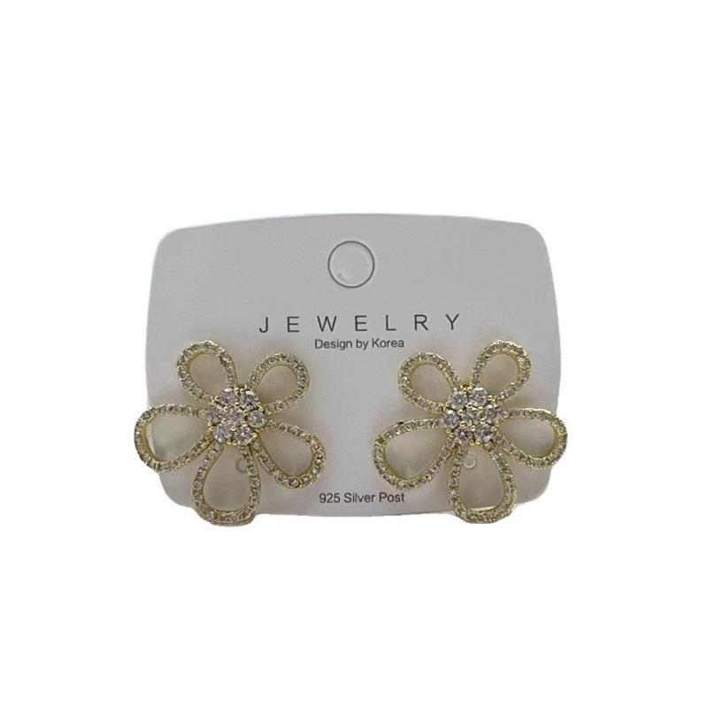 Korean Version Of Temperament Hollow Flower Earrings Personalized Full Diamond Stud Earrings Women'S Silver Needle Copper High-End Earrings